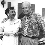 Ike and Mamie posing in front of their Gettysburg home.