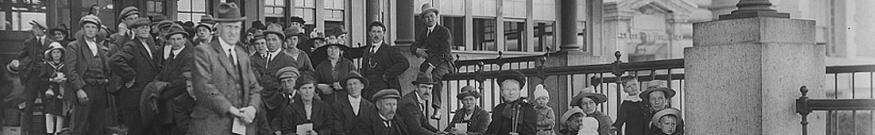 Immigrants awaiting inspection in front of Ellis Island's Main Building