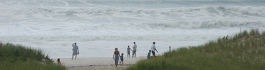 High surf breaks on shore.