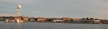 View of Ocean Beach water tower and shoreline community developments as seen from Great South Bay.
