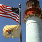 Cape May Point Lighthouse with US and NJ flags
