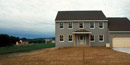An image of a typical new housing development. An image of a typical new housing development.