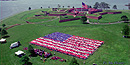 An aerial view of the students forming the Living American Flag. An aerial view of the students forming the Living American Flag.
