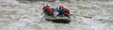 Rafting through rapid on Gauley River Rafting through rapid on Gauley River