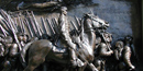 A detail from sculpted Shaw Memorial, showing a man on horseback and soldiers marching alongside. NPS Photo. A detail from sculpted Shaw Memorial, showing a man on horseback and soldiers marching alongside. NPS Photo.
