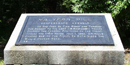 Stone marker with metal plate Stone marker with metal plate
