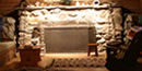 A huge fieldstone fireplace, built by U.S. Marines, is the centerpiece of First Lady Lou Henry Hoover’s sitting room at Rapidan Camp A huge fieldstone fireplace, built by U.S. Marines, is the centerpiece of First Lady Lou Henry Hoover’s sitting room at Rapidan Camp
