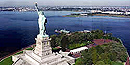Liberty Island dock with statue in background Liberty Island dock with statue in background