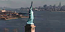 View of statue with harbor in background