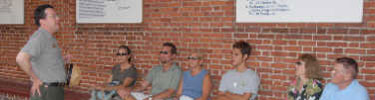 Ranger giving interpretive talk in Franklin Court