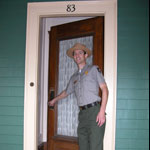 Ranger opening the door to John F. Kennedy National Historic Site