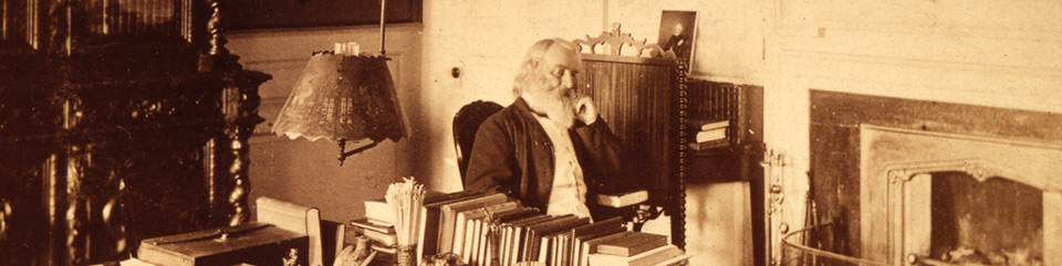 Henry Wadsworth Longfellow in his study, circa 1875.