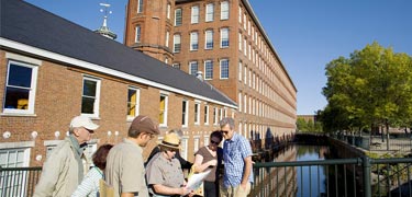 Park ranger outside Boott Cotton Mills Museum