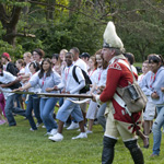 Park Ranger in a British Uniform conducting an education program.