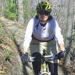 Mountain Biker riding on park trail