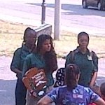 Members of the Great Falls Youth Corps talking with visitors