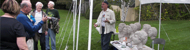 Sculptor talking about his work at the Sculptural Visions Event