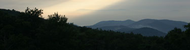 Like a giant searchlight, sun rays shed light on Shenandoah's mountains and trees.