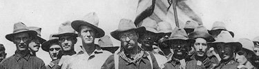 T.R. and his Rough Riders at the top of San Juan Hill, Cuba- 1898