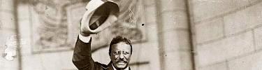 Theodore Roosevelt greeting onlookers.
