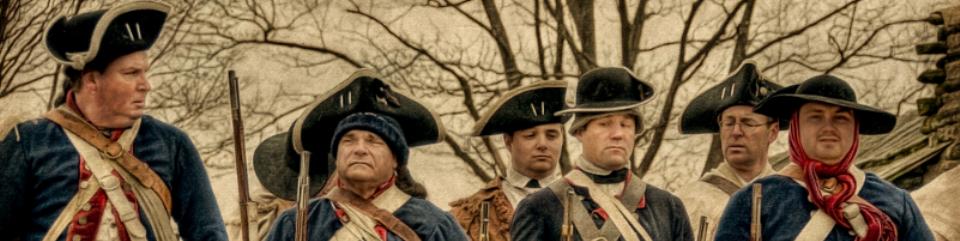 Continental Soldiers are called to attention in 