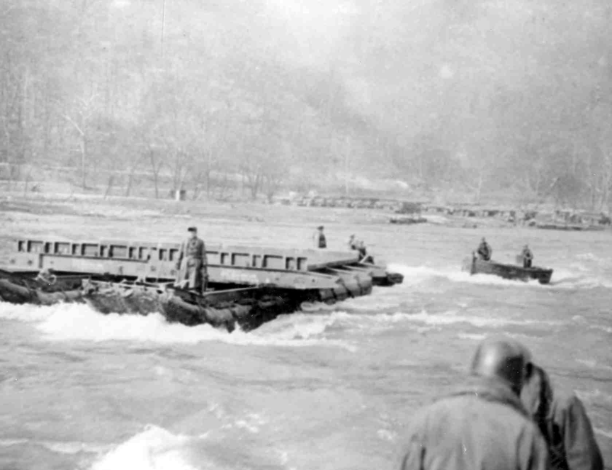historic photograph of men training in the river