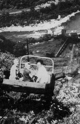 Passengers ride down the steep haulage track at the Kaymoor Mine. Passengers ride down the steep haulage track at the Kaymoor Mine.