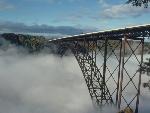 Fog surrounds New River Gorge Bridge