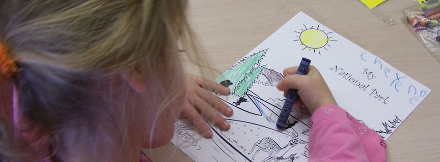 young student coloring