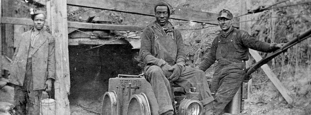 historic photos of miners at Kaymoor mine entrance