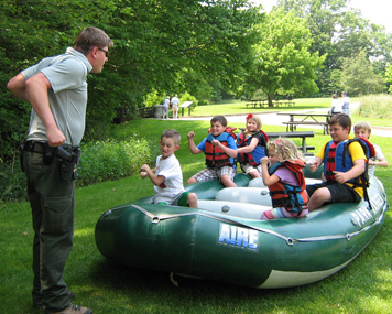 River Ranger with kids in raft