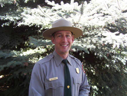 Portait photo of Don Striker in NPS uniform