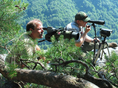 Craig Stihler and Matt Varner observe the falcons using spotting scopes