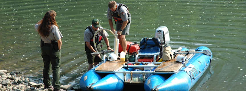 rangers preparing for a river patrol