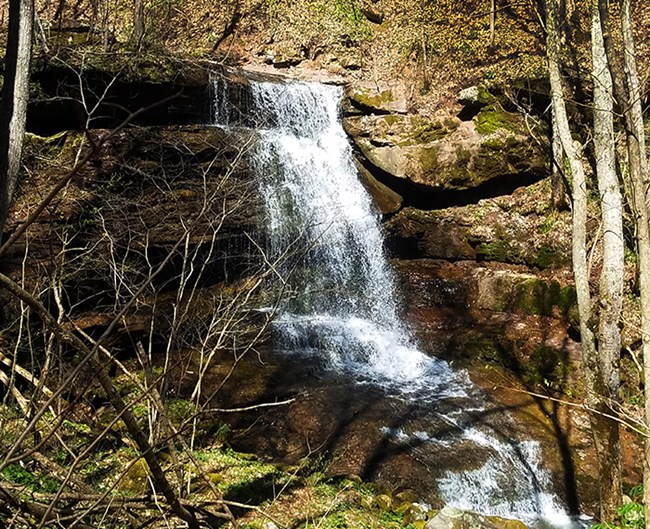 Water flowing off a rock shelf