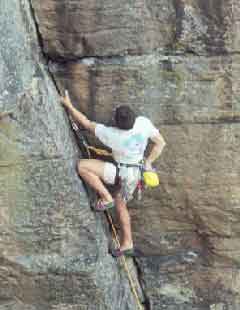 rock climber on cliff face