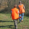 two hunters wearing blaze orange
