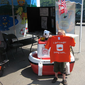 young visitor with water safety tee shirt