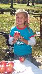 Girl holding pomanders she just made