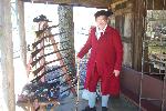 Living history interpreter presents gun display