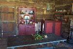 Historic cabin decorated for the holidays