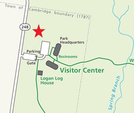 A red star above the parking area marks the designated area.