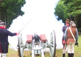 Firing the cannon for the 225th Anniversary celebration