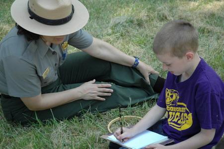 Regina works with local student