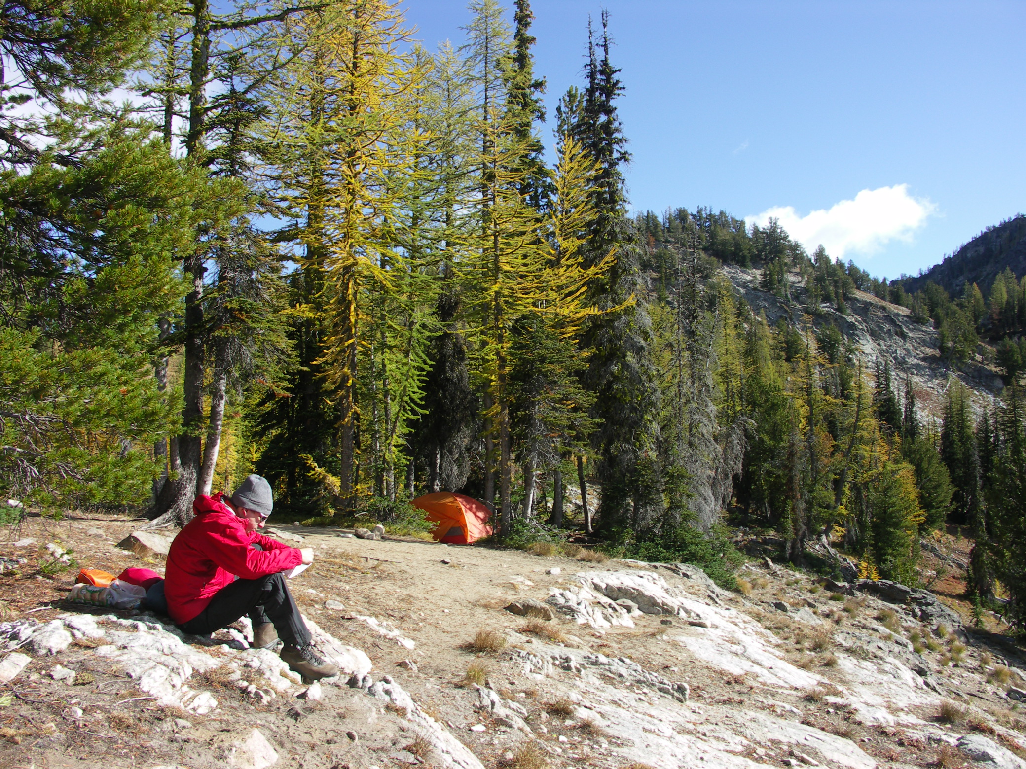 Hiker and tent