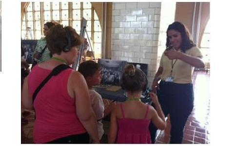 Emily- one of our interns- with visitors at Ellis Island