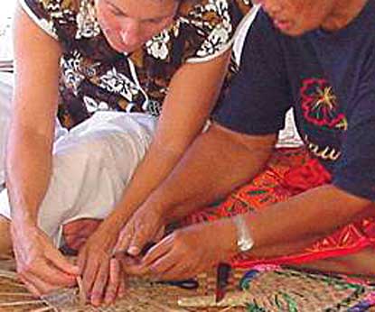 Artisans weaving pandanus
