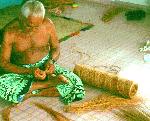 Fitiuta man making sennit