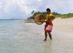 Ofu fisherman with basket fish trap