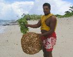 Ofu fisherman with basket fish trap